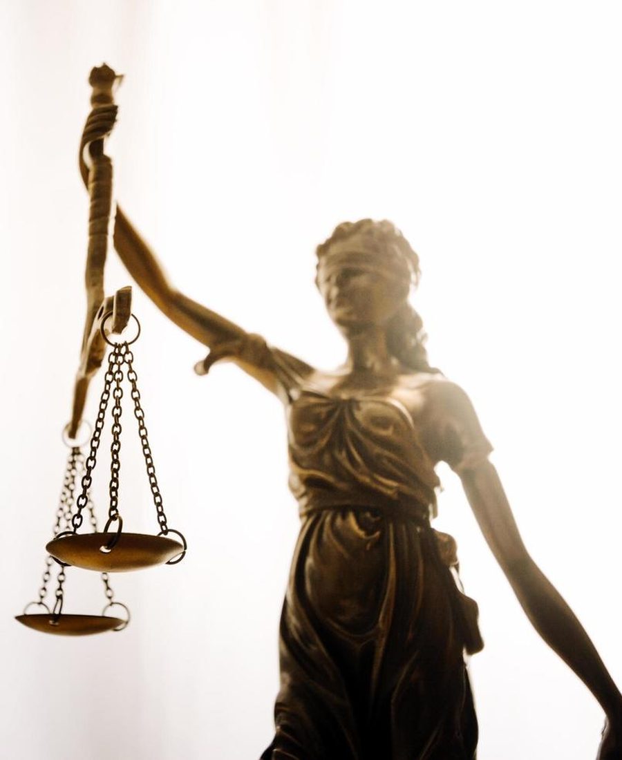 Lady Justice statue holding the scales